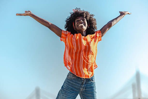 istock Cheerful woman enjoying a bright sunny day 2224467178