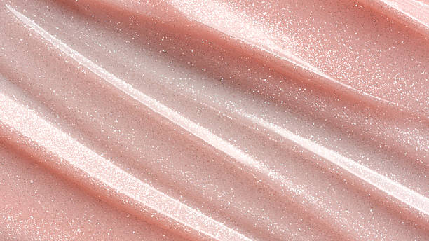 istock Shimmer pink or beige cosmetic texture with smooth flowing lines 2224470854