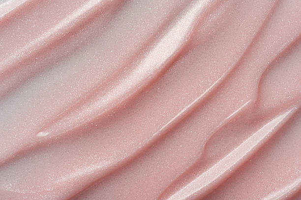 istock Shimmer pink or beige cosmetic texture with smooth flowing lines 2224470881