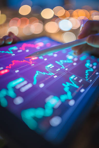 istock Tele Financial professional woman using digital platform analyzing themetic data on her tablet related to finance, business analysis, and corporate strategy. 2224474498