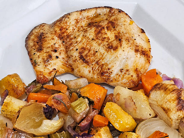 istock Chicken breast with vegetables 2224476760