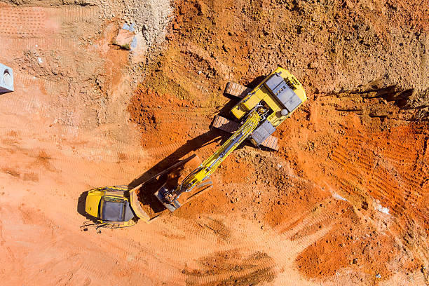 istock Excavation process underway at construction site showing heavy machinery in action during works day 2224476923