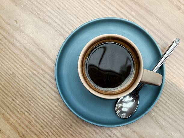 Overhead view of a cup of black coffee