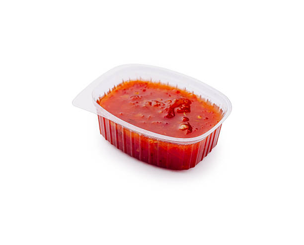 istock Tangy dipping sauce in a small plastic container ready for meals 2224482640