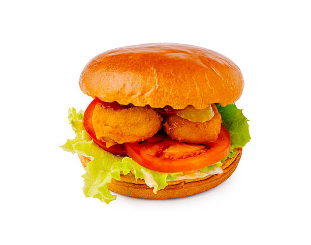 istock Delicious burger with crispy filling and fresh vegetables on a soft bun 2224483337
