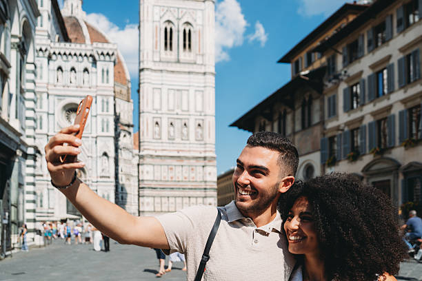 istock Tourists taking selfie in Florence with Duomo in background 2224487087