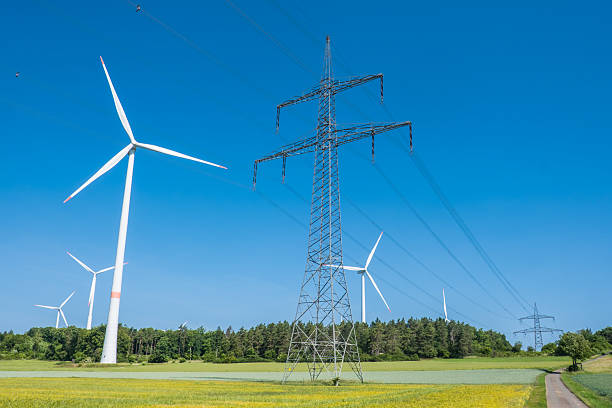 istock Germany electricity grid pylons cables wind turbines renewable green power 2224489766