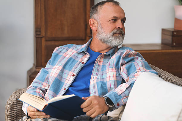 Senior man reading a book