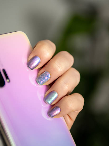 istock Stylish Iridescent Nail Art with Smartphone 2224492517
