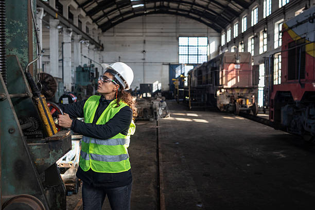 istock Mechanical engineer operating a valve in a train repair shop 2224495010