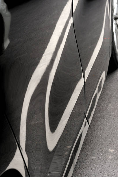 reflect of car and abstract form on metal