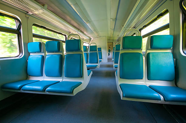 istock Interior of railway wagon with row comfortable blue seats 2224507240