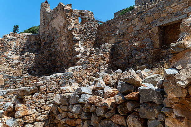 istock Explore the ancient ruins of Spinalonga Island in Crete, Greece during a sunny day 2224510340
