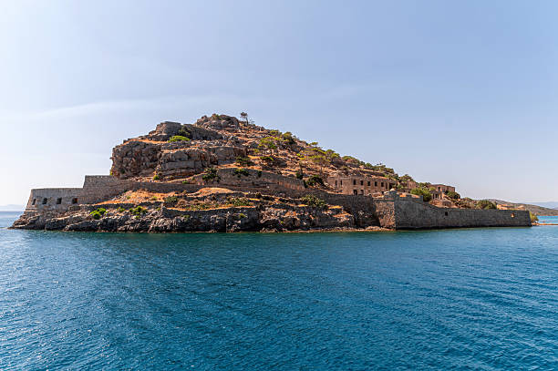 istock Historical Spinalonga Island in Crete showcases ancient architecture against a clear sky 2224510805