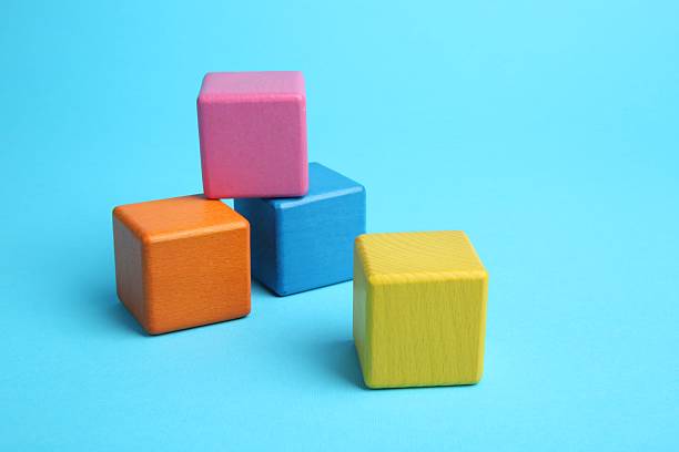 istock Many colorful cubes on light blue background 2224512811