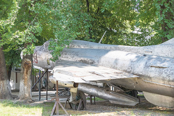A military plane from the Vietnam War that fought on the side of North Vietnam on display in front of a building in Ha Long City, Vietnam