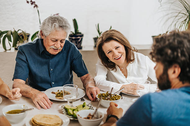 istock Family having lunch at home 2224516886