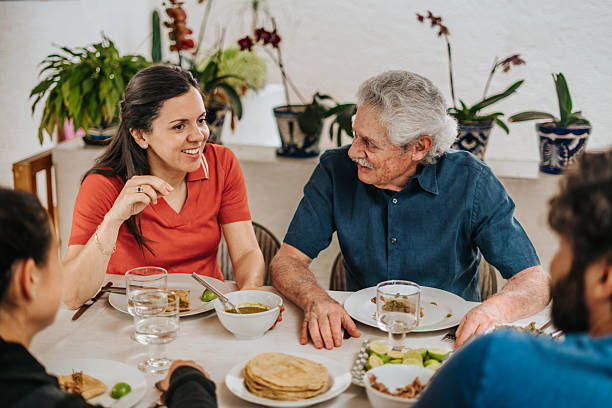 istock Family having lunch at home 2224517019