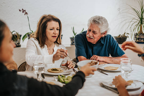 istock Family having lunch at home 2224517222