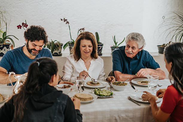 istock Family having lunch at home 2224517256