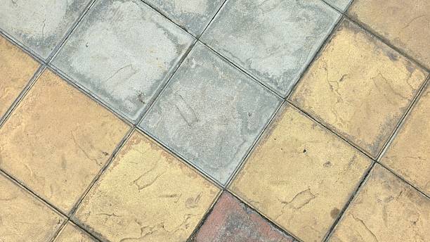 istock Multi-colored floor tiles with stains and scratches. 2224519790