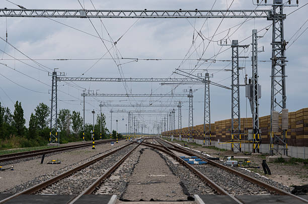 istock Railway junction with electric overhead lines 2224520449