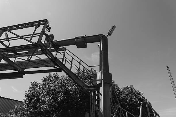istock Sturdy construction framework rises against a bright sky while a crane looms in the background during a sunny afternoon 2224521153
