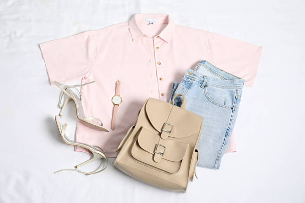 istock Stylish outfit with backpack on white fabric, flat lay 2224521266