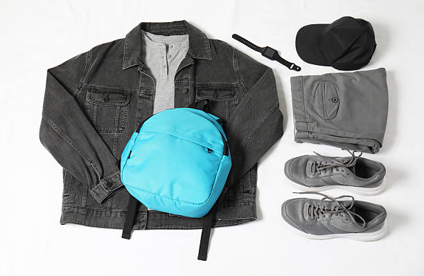istock Stylish outfit with backpack on white background, above view 2224521267
