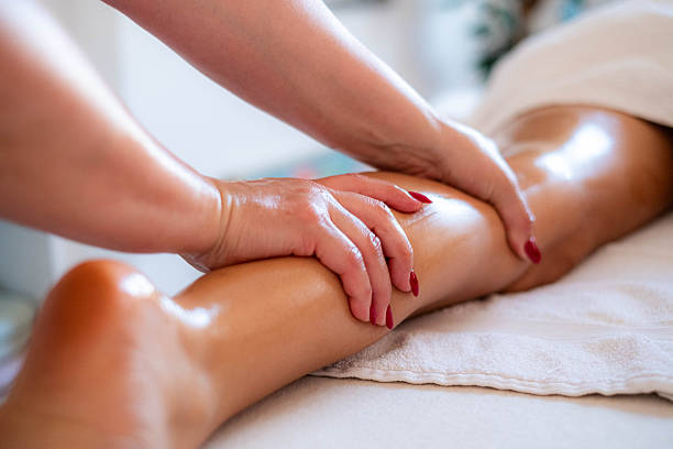 istock woman massage leg 2224522129