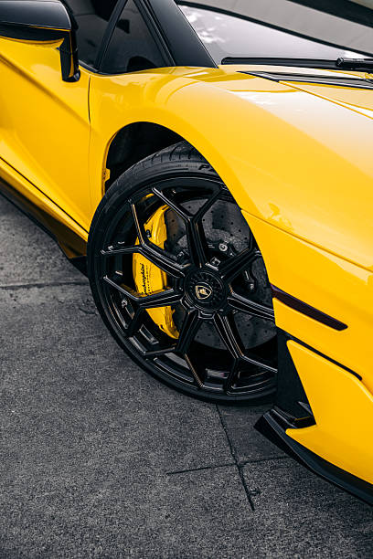 Seattle, WA, USAOctober 15, 2024Lamborghini Aventador showing center lock wheel and green brake caliper