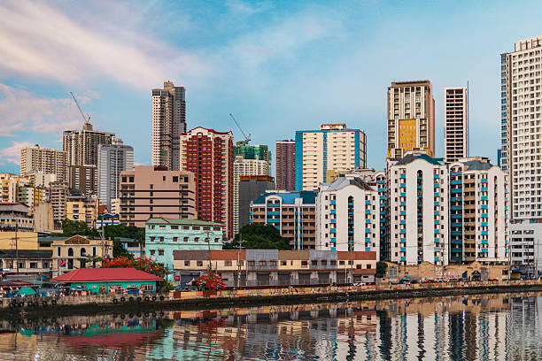 istock Binondo’s Chinatown modern skyline and bridges over the Pasig River with a dense urban sprawl  – Manila, Philippines 2224528754
