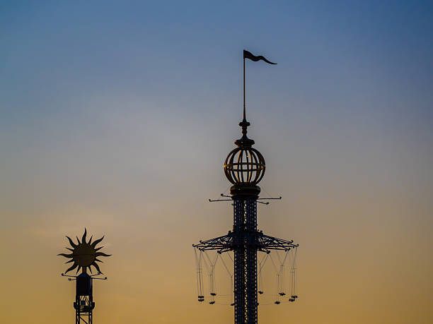 istock Silhouette of Amusement Park Rides at Sunset 2224530037