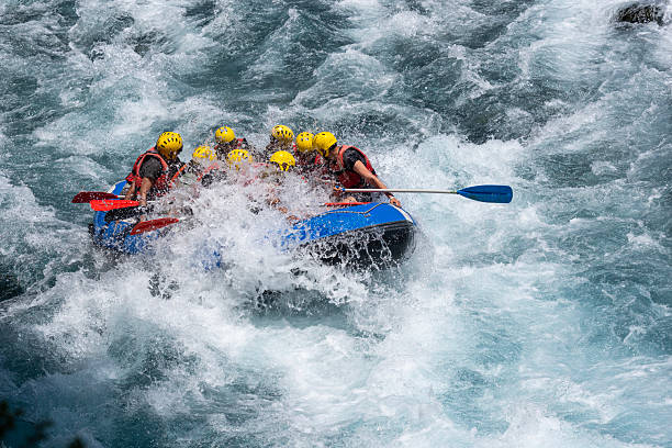 istock Group of People White Water Rafting on a Wild River 2224530579