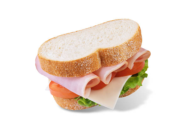 istock Sandwich with ham, cheese and lettuce on white isolated background 2224532675