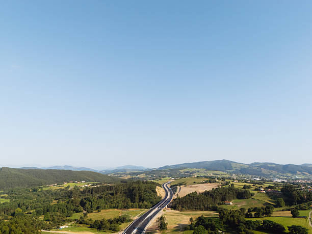 istock Landscape with highway and blue sky 2224534324