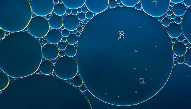 istock Oil bubbles. Oil bubbles on water. Abstract texture in blue tones 2224534449