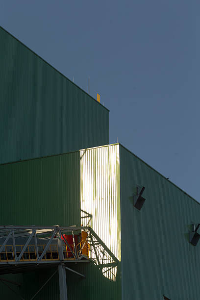 istock A green building stands out against a clear blue sky 2224536127