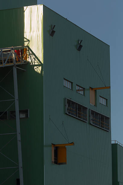 istock There is a green building featuring a staircase located on its side 2224537440