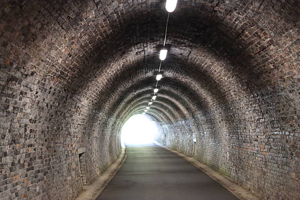 istock View along a pedestrian and cycle tunnel on a disused railway line 2224540680