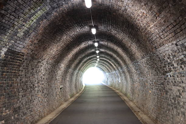 istock View along a pedestrian and cycle tunnel on a disused railway line 2224540730
