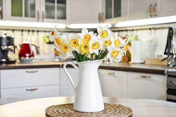istock Bouquet of daffodils in interior of the kitchen 2224546468