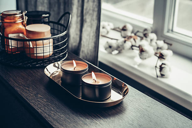 istock Burning candles on golden tray 2224546469