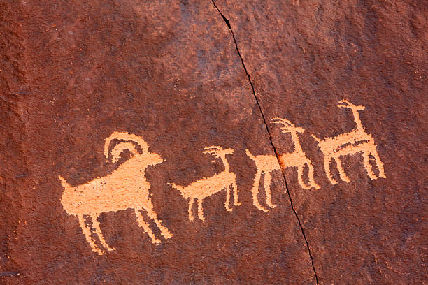 USA, Utah, Newspaper wall, Navajo craving on rock wall.