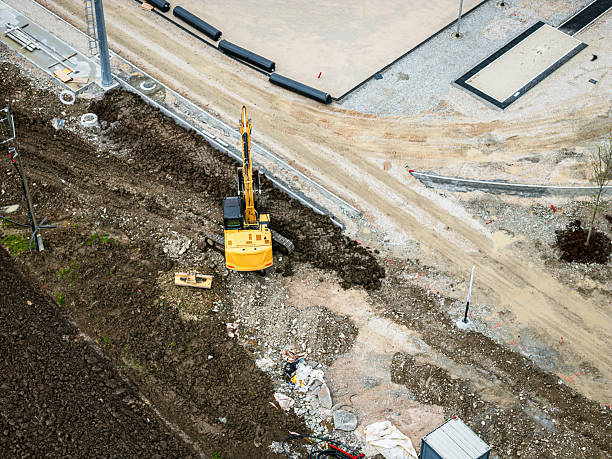 istock Aerial View of Construction Site with Excavator 2224551897