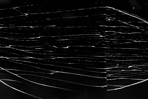 istock cracked glass isolated in black background 2224553825