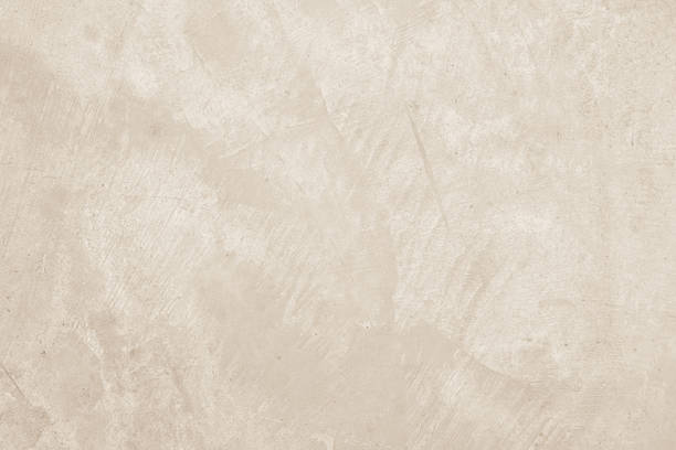 istock Concrete wall texture background. Close up retro plain cream color cement wall background texture. 2224554098