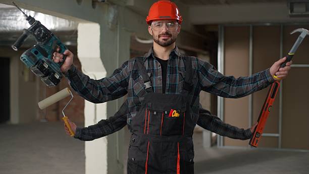 istock Professional skilled male builder multitasking renovation expert Caucasian business man engineer hardhat raised four arms power tools hammer level roller handyman teamwork building construction site 2224555186