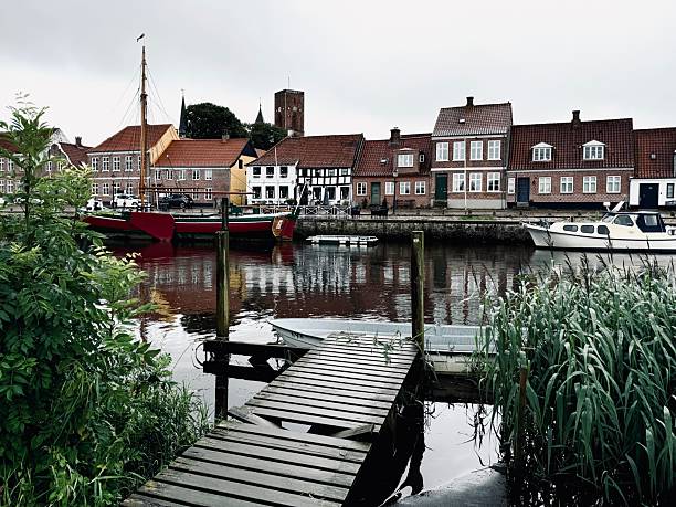 istock Riverfront houses and tower of Ribe Cathedral 2224555271