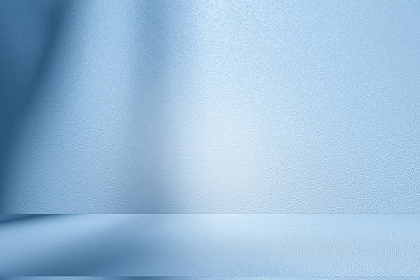 istock Studio style background wall decoration presentation uses white and blue tones. with shadows cast from a nearby window, concept creating a decorative 2224571489